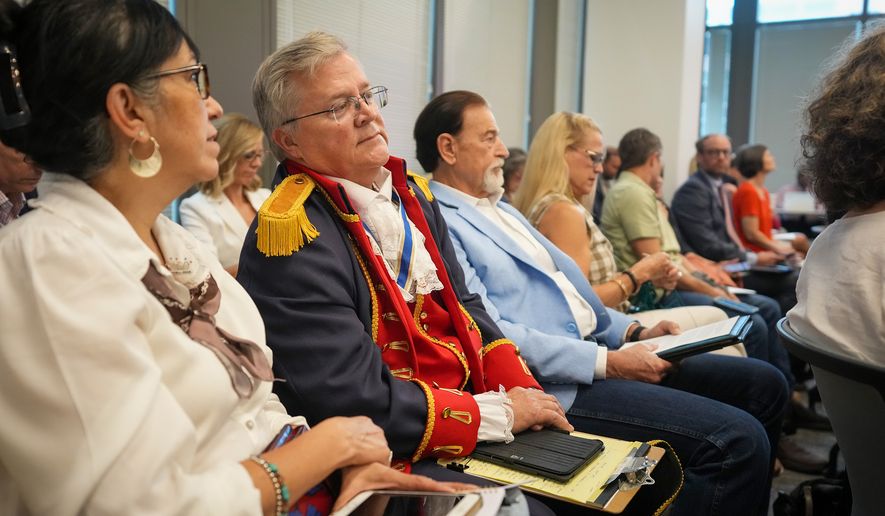 Robert Mearns of Granbury, dressed as an American Revolutionary War soldier, listens during a meeting on proposed social studies standards at the Barbara Jordan Building in Austin on Monday, June 22, 2026. (Jay Janner/Austin American-Statesman via AP)