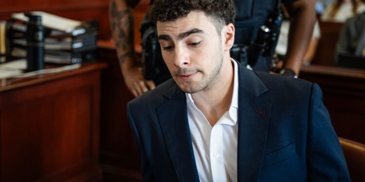 Luigi Mangione gets stuck in an elevator as judge delays his federal trial until January