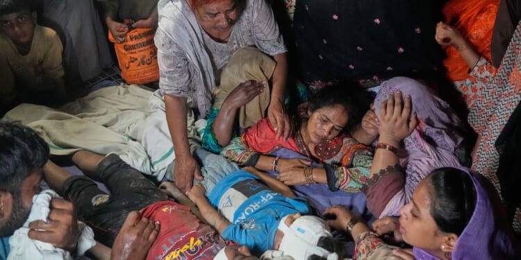 Roof of tutoring center collapses in eastern Pakistan, killing at least 14 children
