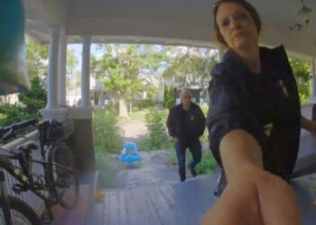 Another New York resident says he was warned by officers after criticizing ICE