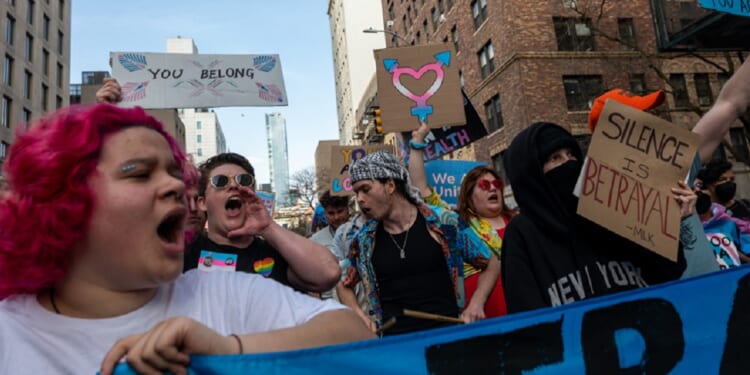 Activists march through Manhattan in March 2025 during a Trans Day of Visibility protest.