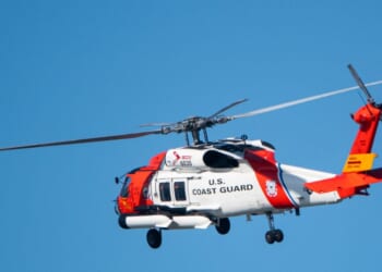 A U.S. Coast Guard Sikorsky MH-60T Jayhawk helicopter approaches the U.S. Coast Guard Sector San Diego air station on Dec. 20, 2024, in San Diego, California.