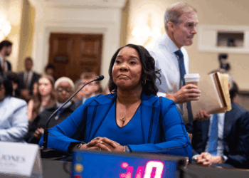 Rep. Jim Jordan, R-Ohio, walks by Regina Wallace-Jones, CEO of ActBlue, as she prepares to testify during the House Administration Committee hearing titled "Preventing Fraudulent Donations: Transparency, Verification, and Accountability," in Longworth building on Wednesday, June 10, 2026. Wallace-Jones invoked her Fifth Amendment privilege. (Tom Williams/CQ-Roll Call, Inc via Getty Images)