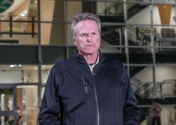 Alaska Governor Mike Dunleavy standing