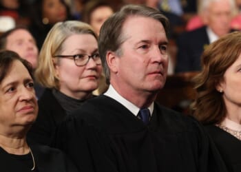 Supreme Court Chief Justice John Roberts, center, was joined by Supreme Court Justices Elena Kagan, left, and Amy Coney Barrett, right, along with Kagan's fellow liberals, Sonia Sotomayor and Ketanji Brown-Jackson, on the ruling.