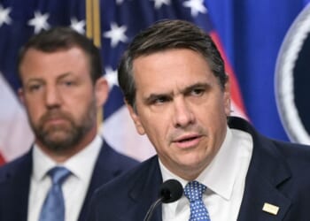 Acting Attorney General Todd Blanche, alongside Secretary of Homeland Security Markwayne Mullin, speaks during a press conference about safeguarding unaccompanied immigrant children at the Department of Justice headquarters in Washington, D.C., on June 11, 2026.