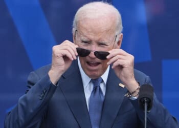 Biden accuses Trump of corruption then struggles to find way off stage