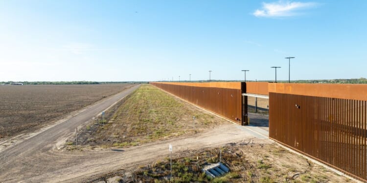 In an aerial view, a section of border fencing is seen on Oct. 15, 2025, in La Casita-Garciasville, Texas.