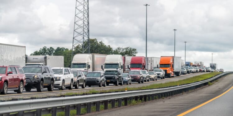 A section of I-95 near Jacksonville, Florida, with a long line of cars stuck in a traffic jam on July 6, 2021.
