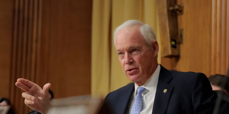 Sen. Ron Johnson asks questions during the confirmation hearing for Dr. Mehmet Oz before the Senate Finance Committee in the Dirksen Senate Office Building on March 14, 2025, in Washington, D.C.