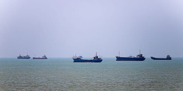 In this picture obtained from Iran's ISNA news agency on June 18, 2026, vessels are seen anchored in Bandar Abbas along the Strait of Hormuz.