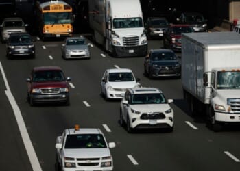 Cars travel southbound on the interstate 95 on November 23, 2021 in Springfield, Virginia.