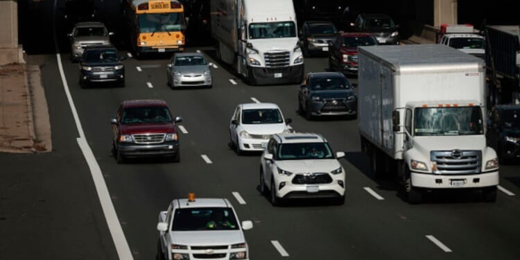 Cars travel southbound on the interstate 95 on November 23, 2021 in Springfield, Virginia.