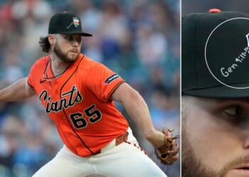 Landen Roupp #65 of the San Francisco Giants modified his "pride" hat with a Bible verse before pitching against the Chicago Cubs Friday in San Francisco, California.