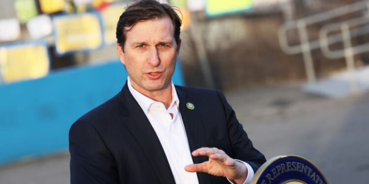 Rep. Dan Goldman speaks during a press conference at the entrance of the migrant relief center at Brooklyn Cruise Terminal on Feb. 2, 2023, in New York City.