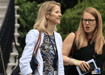 White House Counsel Dana Remus (L) and Deputy Chief of Staff Jennifer O'Malley Dillon depart the White House on July 13, 2021 in Washington, DC. Remus and Dillion are accompanying U.S. President Joe Biden as he travels to Philadelphia where he will deliver a speech about protecting the right to vote at the National Constitution Center. (Photo by Chip Somodevilla/Getty Images)