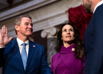 Sen. Jon Husted, as his wife Tina Husted looks on, is ceremonially sworn in by Vice President J.D. Vance in the Old Senate Chamber at the U.S. Capitol on Jan. 21, 2025, in Washington, D.C.