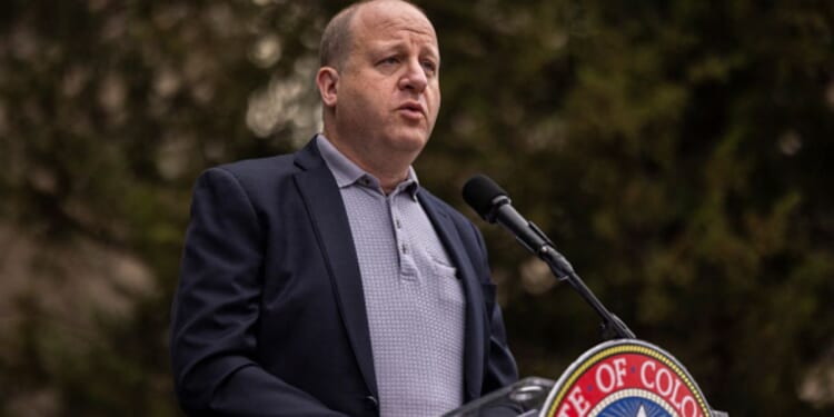 Colorado Governor Jared Polis speaks at a community gathering held for kidnapped Israeli citizens in Gaza on June 4, 2025 in Boulder, CO.