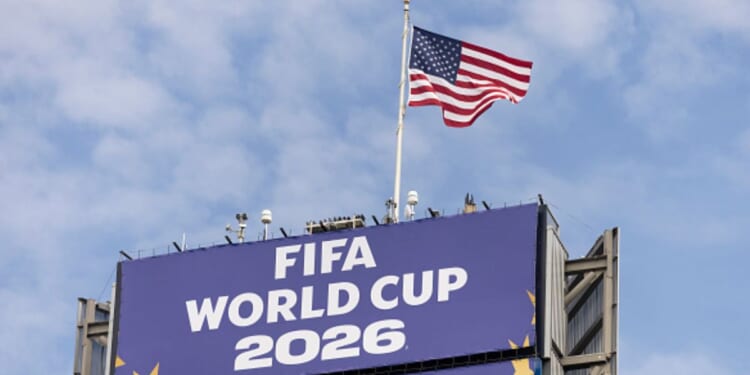 The American flag flies above FIFA World Cup signage in Seattle, Washington on June 19, 2026.
