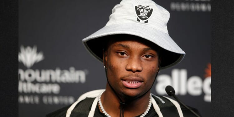 Henry Ruggs III speaks with reporters at the Las Vegas Raiders Headquarters in Henderson, Nevada, in a file photo dated July 28, 2021, a few months before the deadly DUI crash that killed a woman and sidelined his career.