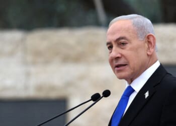 Israeli Prime Minister Benjamin Netanyahu speaks during a ceremony commemorating Israel's Remembrance Day for fallen soldiers, or Yom HaZikaron, at the Military Cemetery on Mount Herzl in Jerusalem on April 21, 2026.