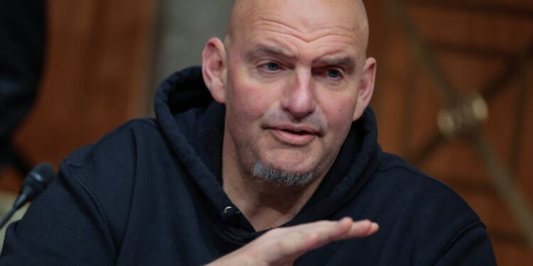 Democratic U.S. Senator John Fetterman speaks during a hearing in the Dirksen Senate Office Building on Capitol Hill in Washington on March 19, 2026.
