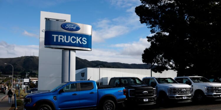 Ford pickup trucks are displayed on the sales lot at Serramonte Ford on Jan. 6, 2026, in Colma, California.