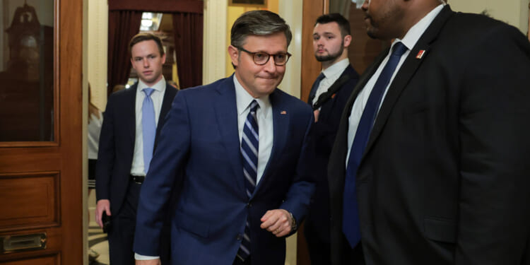 U.S. Speaker of the House Mike Johnson walking.