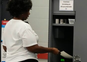 Georgia’s QR codes for counting votes will remain for midterms after lawmakers vote to delay a fix