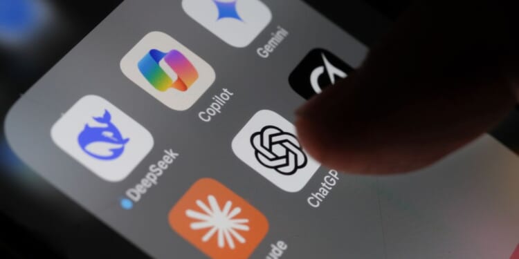 An iPhone screen with artificial intelligence icons on May 3, 2025, in London, United Kingdom.