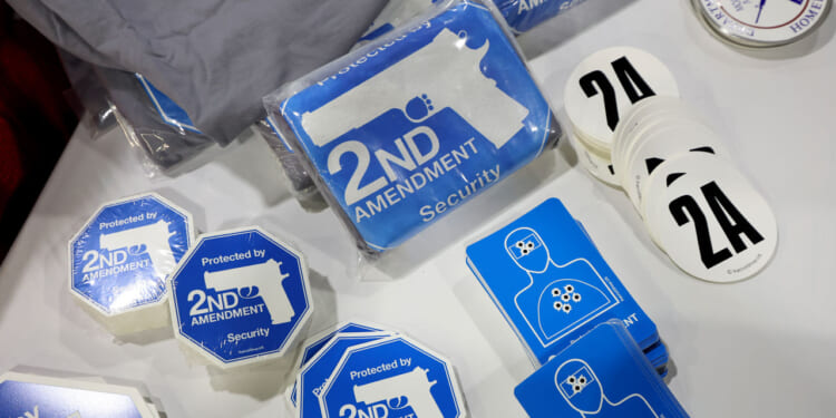 2nd Amendment stickers sit on a table.