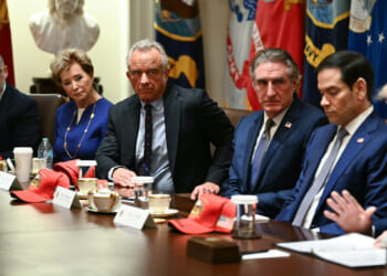 US Secretary of Education Linda McMahon, US Secretary of Health and Human Services Robert F. Kennedy Jr., US Secretary of the Interior Doug Burgum, US Secretary of State Marco Rubio look on as US President Donald Trump.