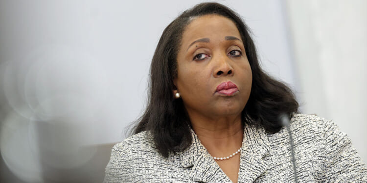 Federal Reserve Board Governor Lisa Cook participates in a board meeting at the Federal Reserve on March 19, 2026 in Washington, DC. The board met to meet to discuss a proposal to loosen capital requirements for large and regional banks, scaling back stricter regulations. (Kevin Dietsch/Getty Images)