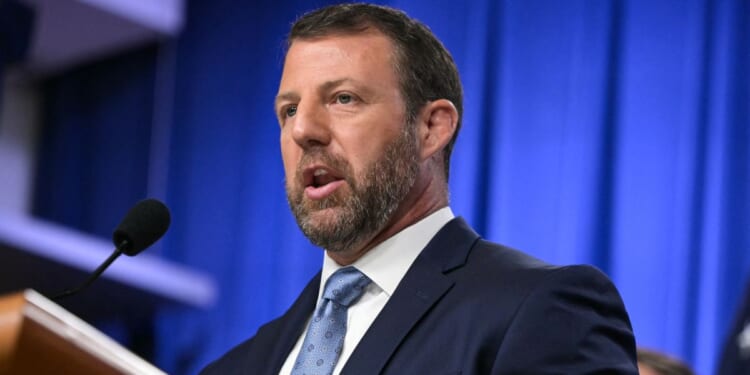 Secretary of Homeland Security Markwayne Mullin speaks during a press conference about safeguarding unaccompanied immigrant children at the Department of Justice headquarters in Washington, D.C., on June 11, 2026.