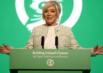 Northern Ireland First Minister Michelle O'Neill speaking at a podium