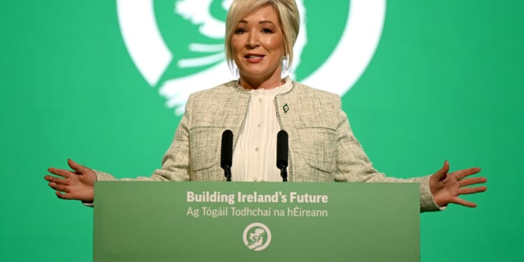 Northern Ireland First Minister Michelle O'Neill speaking at a podium