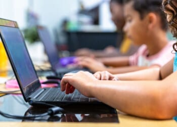 Elementary school students in a computer lab.