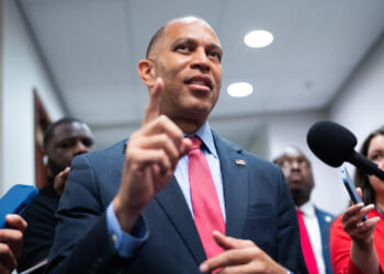 House Minority Leader Hakeem Jeffries talks with reporters in the Capitol Visitor Center.