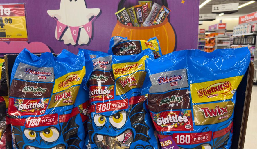 FILE - Halloween candy is displayed in a grocery store in Carmel, Ind., Oct. 20, 2025. (AP Photo/Michael Conroy, File)