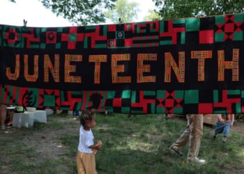 People attend a Juneteenth event in Brower Park on June 19, 2026, in the Crown Heights neighborhood of the Brooklyn borough in New York City.