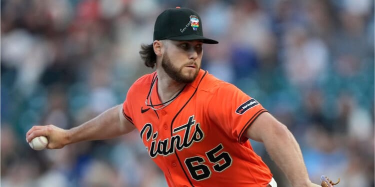 Landen Roupp of the San Francisco Giants pitches against the Chicago Cubs in the top of the first inning of a major league baseball game at Oracle Park on June 12, 2026, in San Francisco, California.