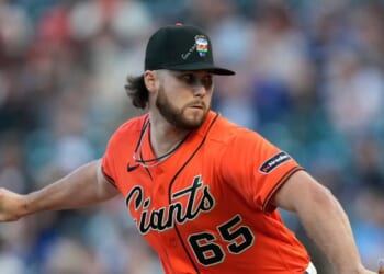 Landen Roupp of the San Francisco Giants pitches against the Chicago Cubs in the top of the first inning of a major league baseball game at Oracle Park on June 12, 2026, in San Francisco, California.