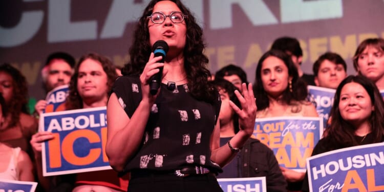 Democratic Congressional candidate Claire Valdez speaks during an election eve rally Monday in New York City.