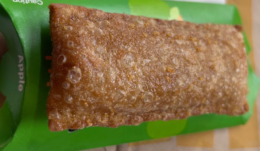 A fried apple pie sold at a McDonald’s is shown in London on Tuesday, June 16, 2026. (AP Photo/Cara Rubinsky)