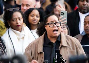 St. Paul Public School board member and activist Chauntyll Allen speaks with media gathered after an arraignment hearing at the Warren E. Burger Federal Building and U.S. Courthouse on Feb. 13, 2026, in St. Paul, Minnesota.