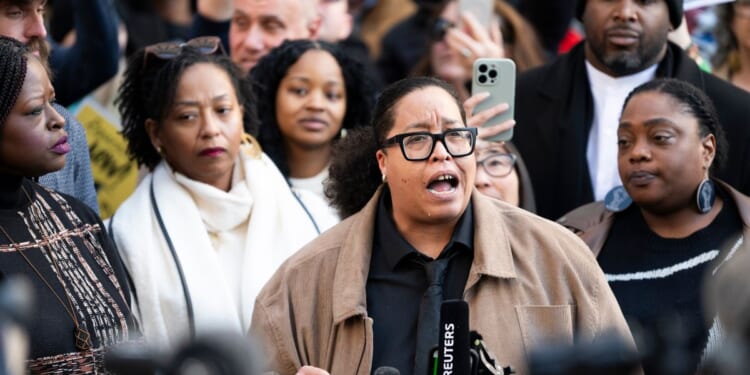 St. Paul Public School board member and activist Chauntyll Allen speaks with media gathered after an arraignment hearing at the Warren E. Burger Federal Building and U.S. Courthouse on Feb. 13, 2026, in St. Paul, Minnesota.