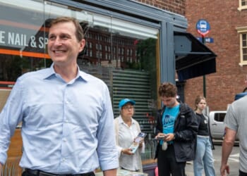 Rep. Dan Goldman greets voters outside a polling station in Manhattan's West Village on June 23, 2026, in New York City.