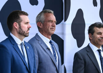 FDA Acting Commissioner for Human Foods Kyle Diamantas, US Secretary of Health and Human Services Robert F. Kennedy Jr., and Former Food and Drug Administration (FDA) Commissioner Martin Makary attend a news conference at the USDA headquarters building in Washington, DC, on July 14, 2025.