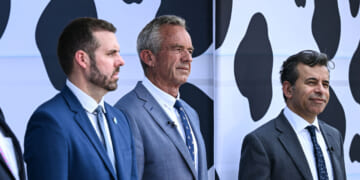 FDA Acting Commissioner for Human Foods Kyle Diamantas, US Secretary of Health and Human Services Robert F. Kennedy Jr., and Former Food and Drug Administration (FDA) Commissioner Martin Makary attend a news conference at the USDA headquarters building in Washington, DC, on July 14, 2025.