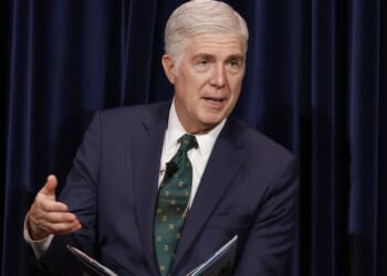 Supreme Court Justice Neil Gorsuch speaking while seated